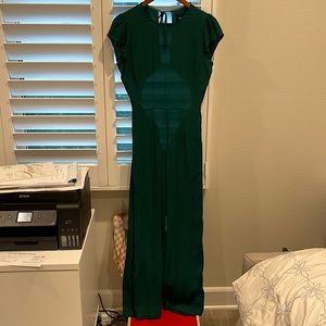 A green backless jumpsuit